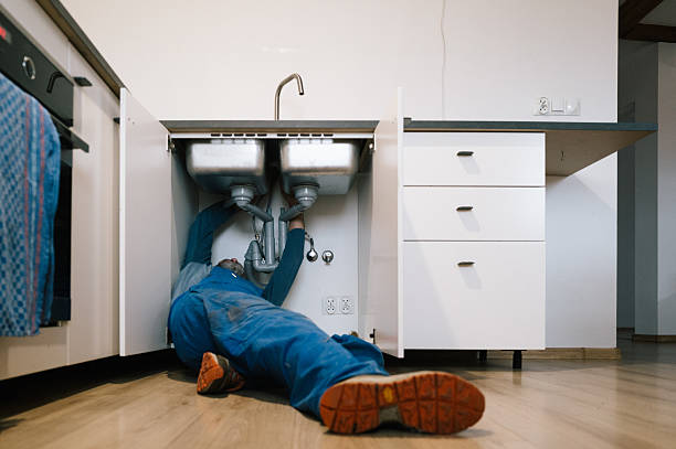 Professional Plumbing technician working in Sorento, IL
